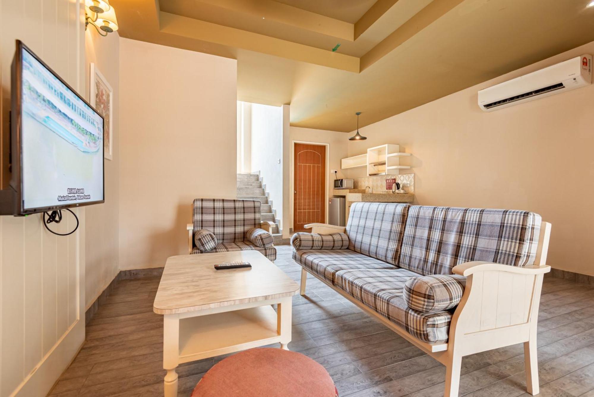 Tasik Villa International Resort Port Dickson Esterno foto A living room in a serviced apartment in Beijing, China